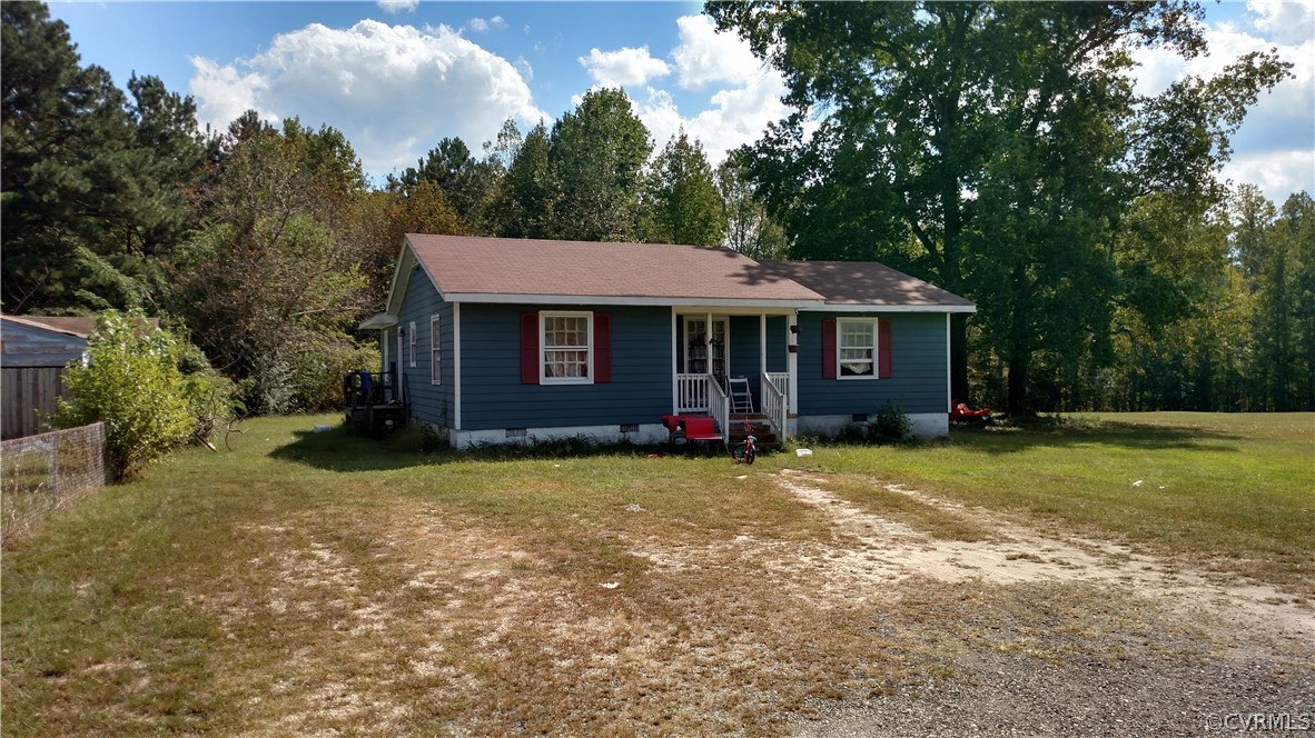 8015 Malboro Avenue Prince George, VA 23875 - Photo 1 of 1 a view of a house with a yard