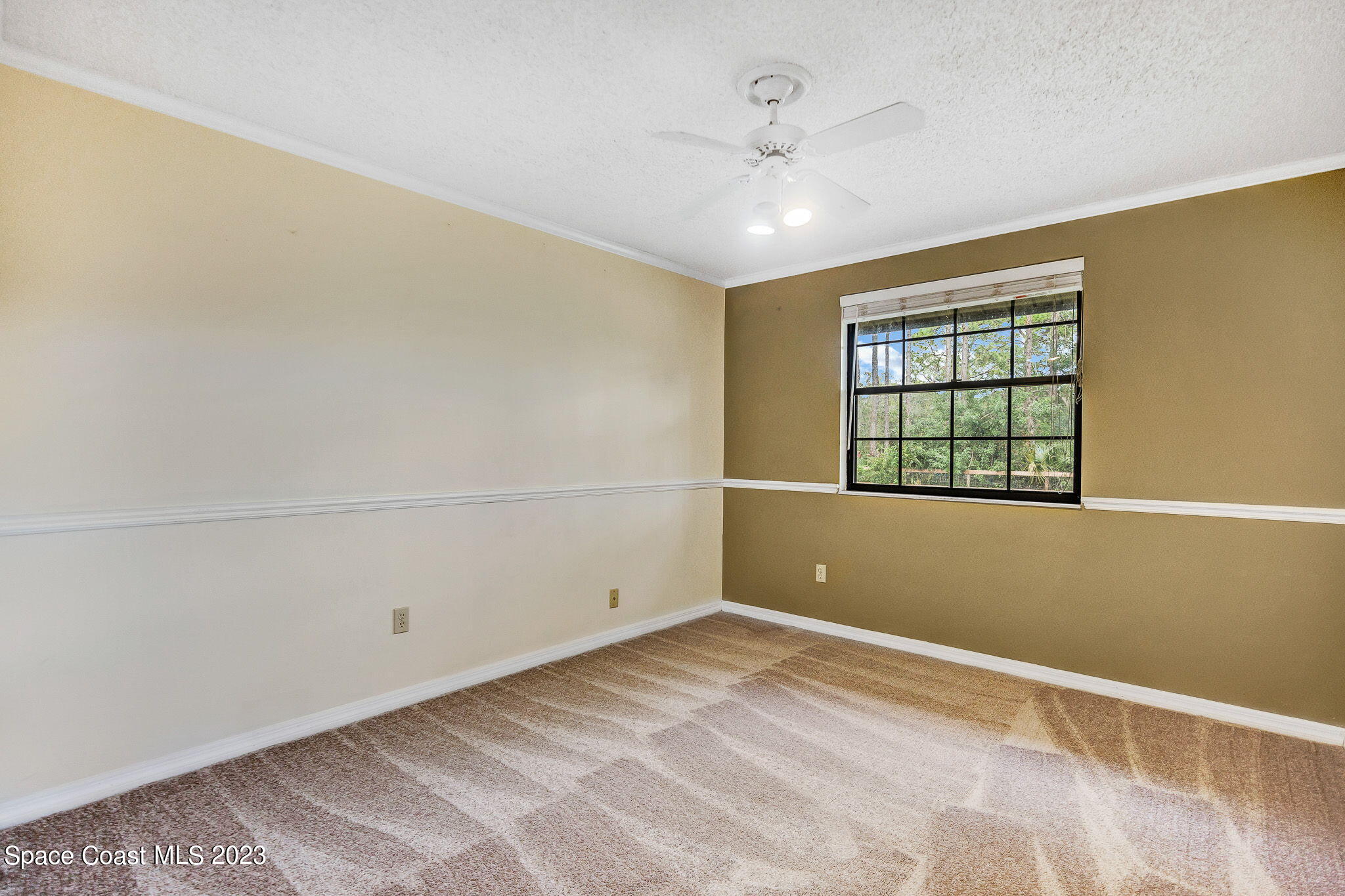 2281 Friday Road Cocoa, FL 32926 - Photo 12 of 72 a view of an empty room with a window