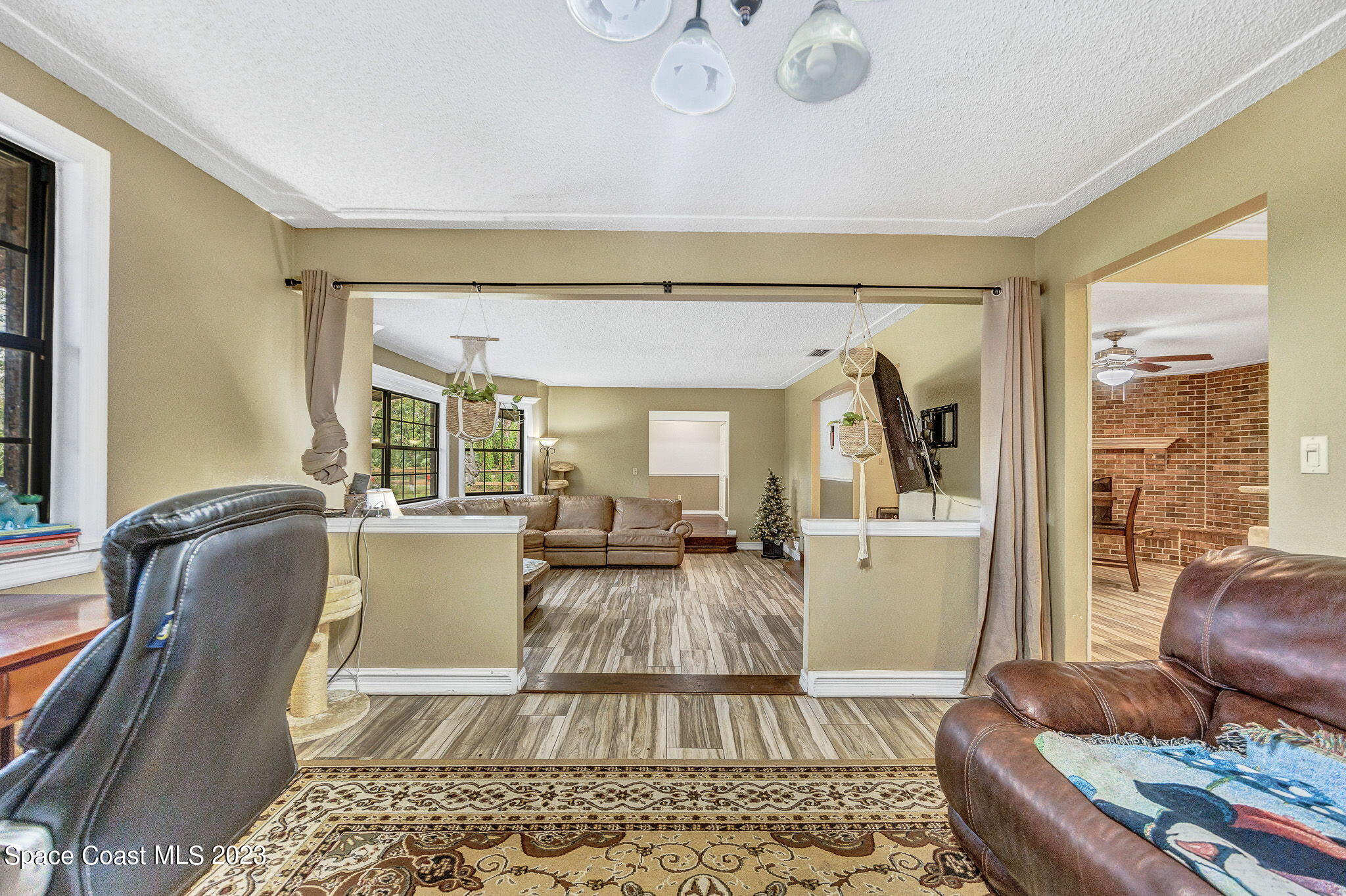 2281 Friday Road Cocoa, FL 32926 - Photo 19 of 72 a living room with furniture and a window