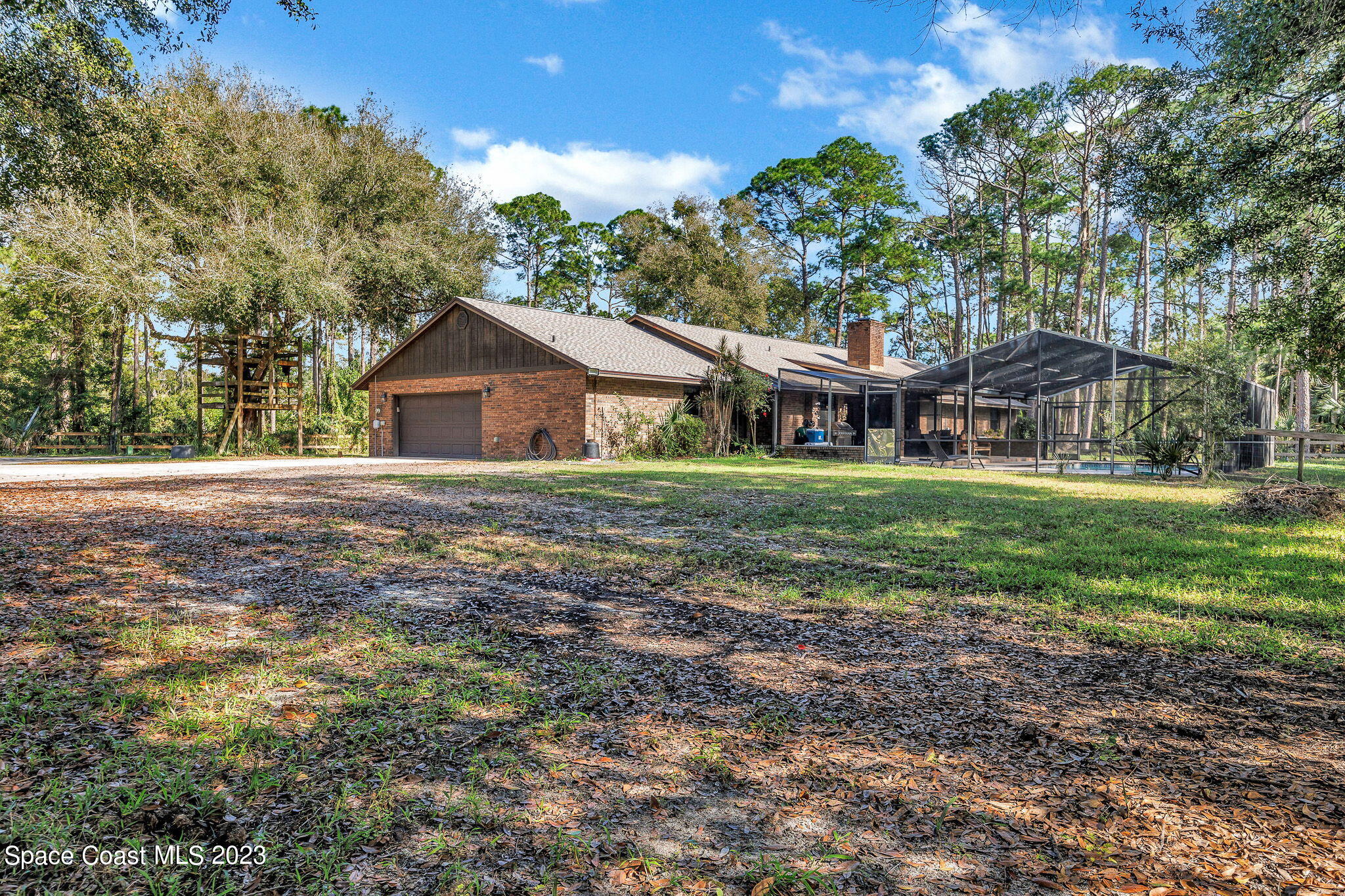 2281 Friday Road Cocoa, FL 32926 - Photo 4 of 72 a house view with a garden space