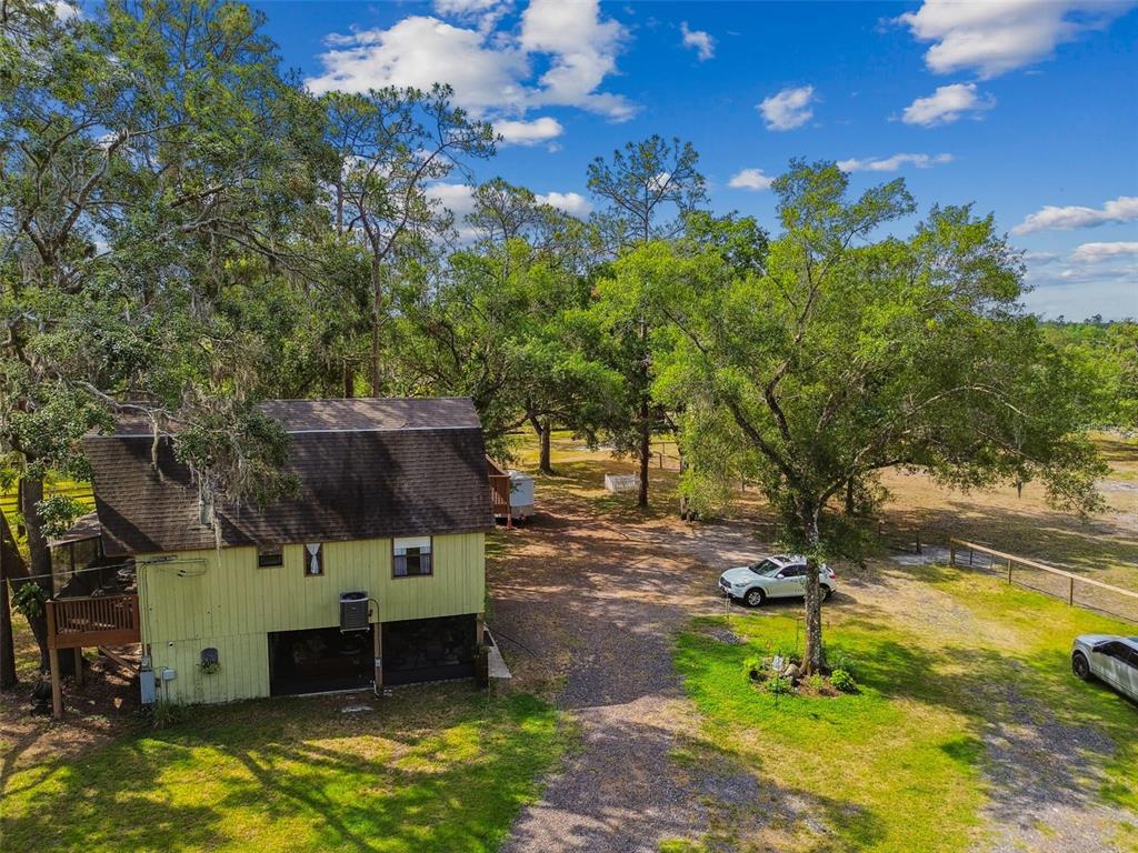 2853 Saffold Road Wimauma, FL 33598 - Photo 59 of 62 a view of a backyard with swimming pool