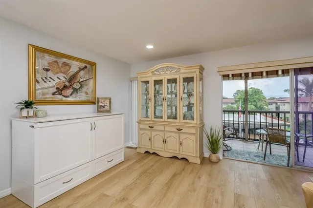 a view of livingroom with furniture wooden floor and window