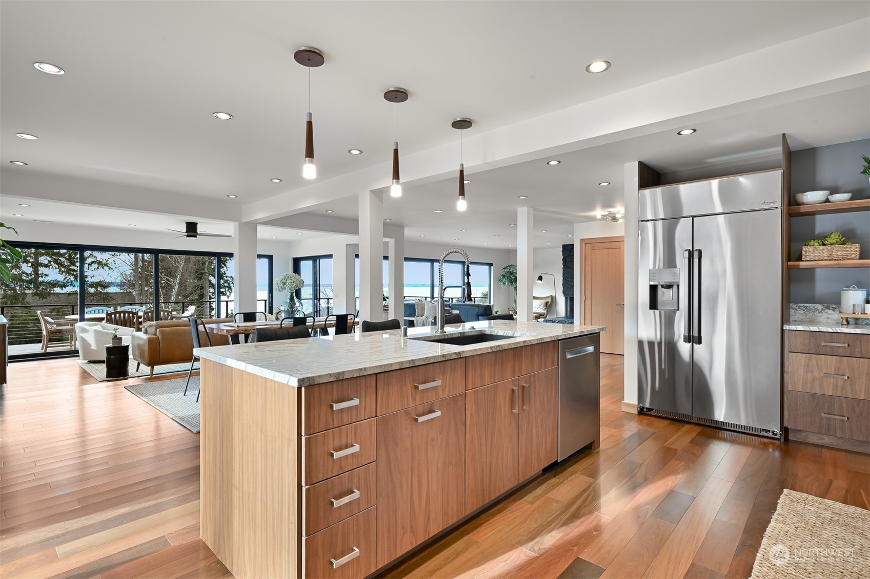426 Bayside Road Bellingham, WA 98225 - Photo 13 of 42 a large kitchen with stainless steel appliances lots of counter space and wooden floor