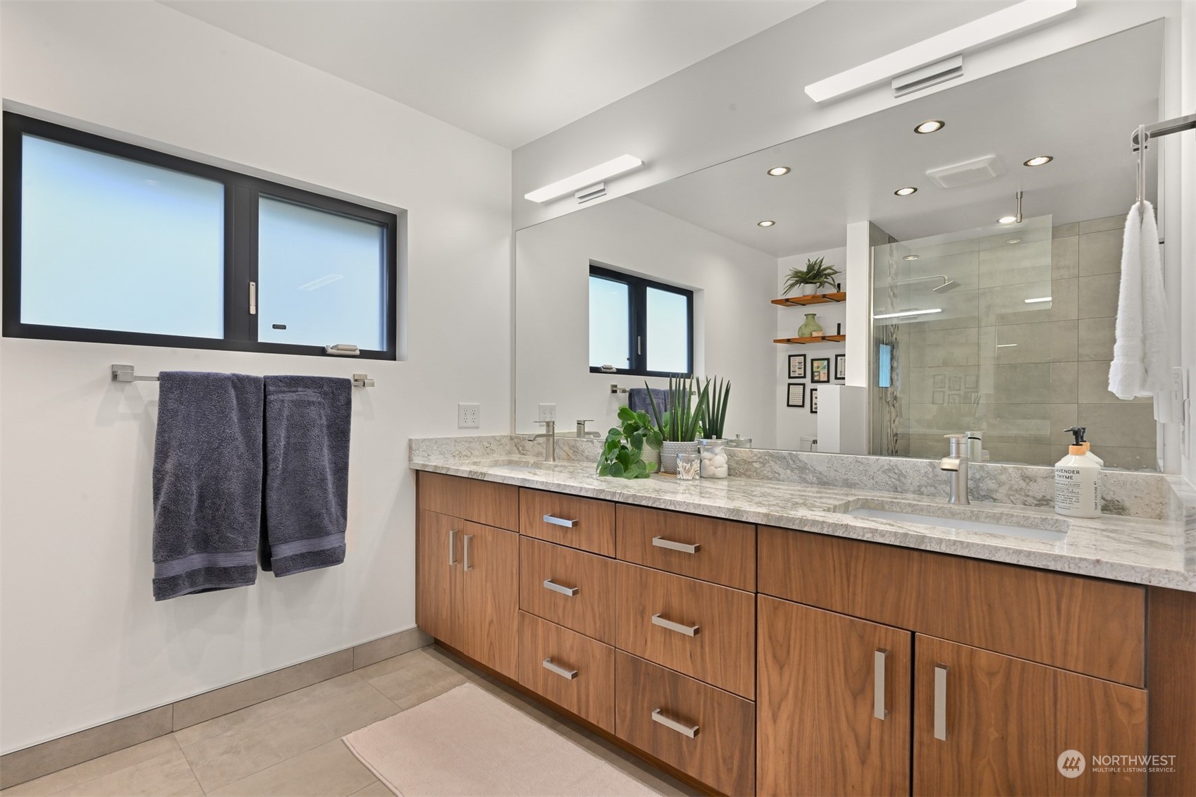 426 Bayside Road Bellingham, WA 98225 - Photo 19 of 42 a bathroom with a granite countertop sink mirror and double