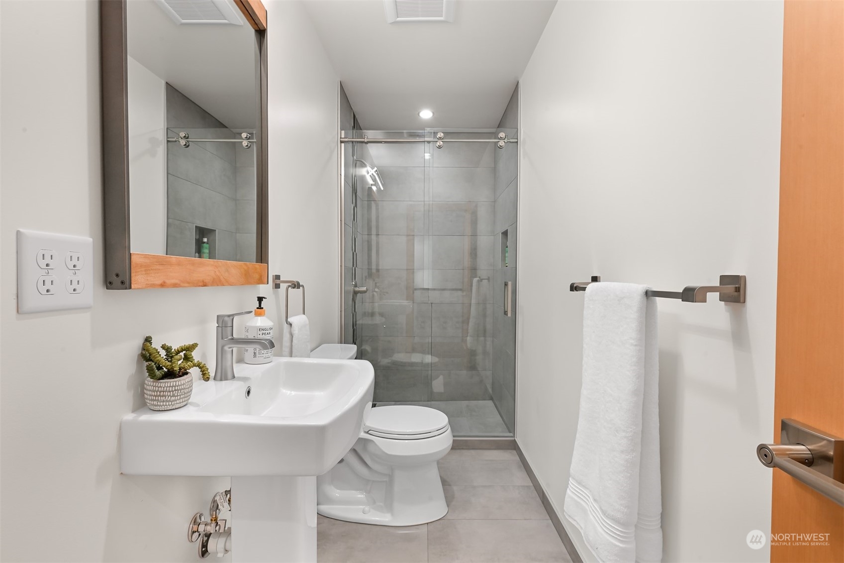 426 Bayside Road Bellingham, WA 98225 - Photo 22 of 42 a bathroom with a sink toilet and shower