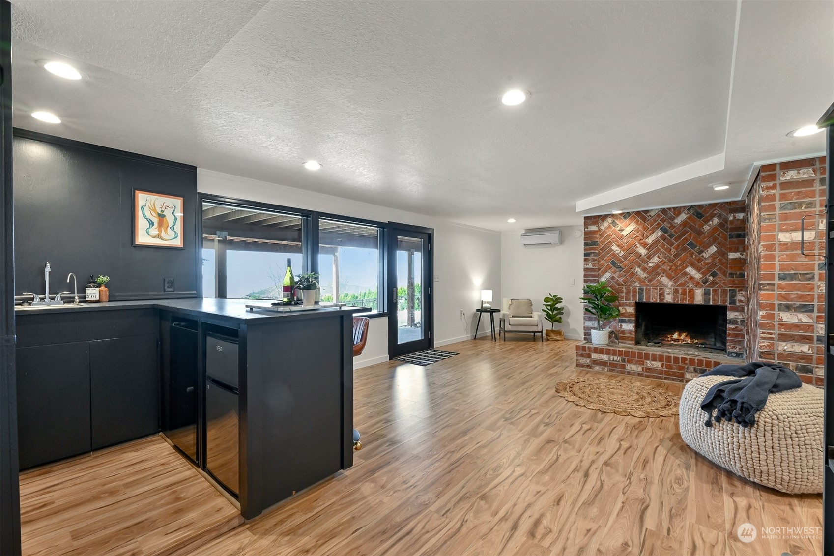 426 Bayside Road Bellingham, WA 98225 - Photo 23 of 42 a living room with furniture and a flat screen tv