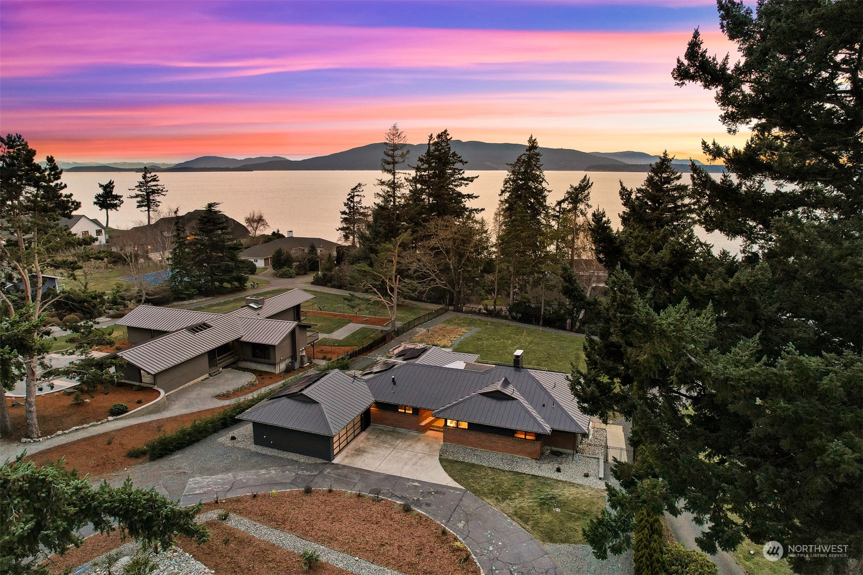 426 Bayside Road Bellingham, WA 98225 - Photo 31 of 42 an aerial view of a house with a garden