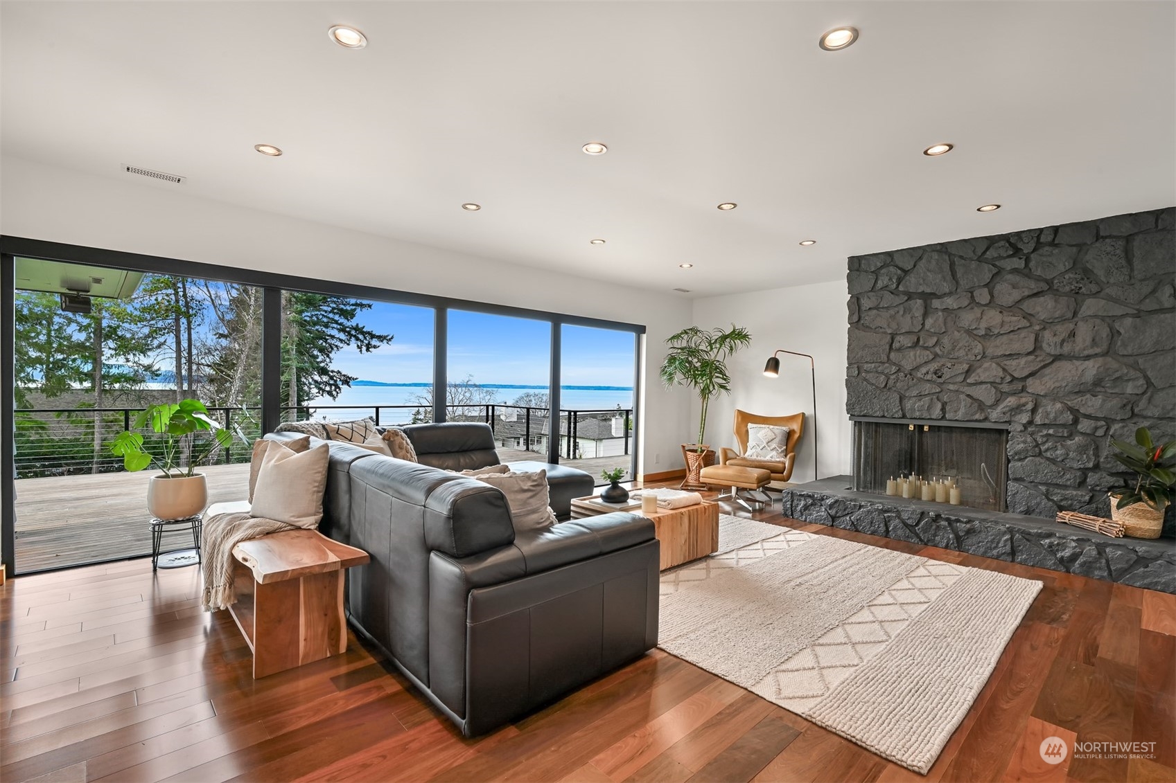426 Bayside Road Bellingham, WA 98225 - Photo 7 of 42 a living room with furniture and a fireplace