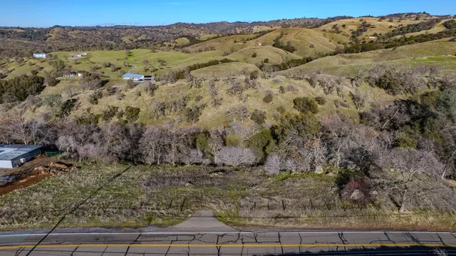 a view of a yard with an outdoor space