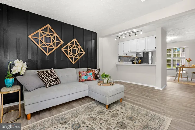 a theatre with furniture and wooden floor