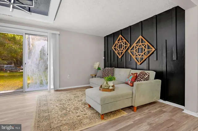 a bedroom with a bed and a view of bathroom