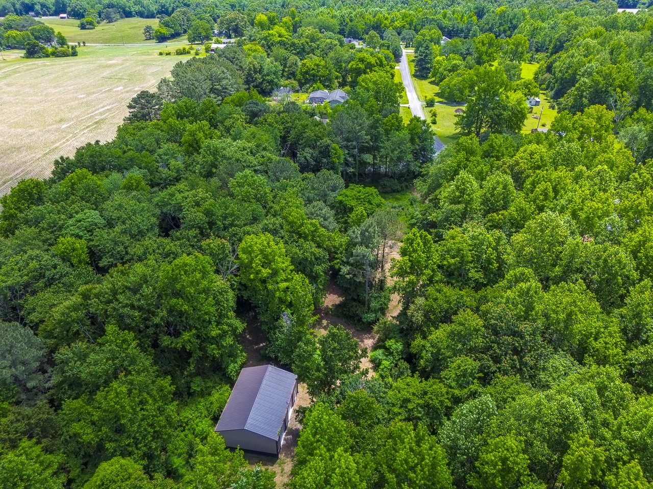 23 Grassy Branch Road Flintville, TN 37335 - Photo 17 of 24 an aerial view of residential house with outdoor space and trees around