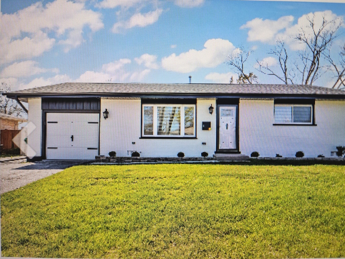 Undisclosed Address Wheeling, IL 60090 - Photo 1 of 1 a house view with a swimming pool and deck