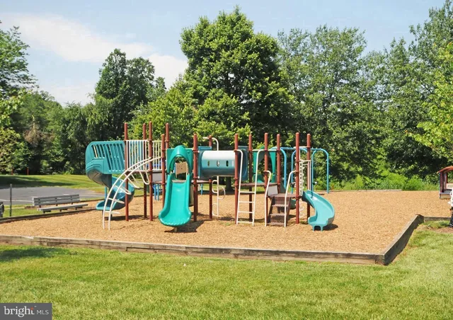 a view of a park with swings
