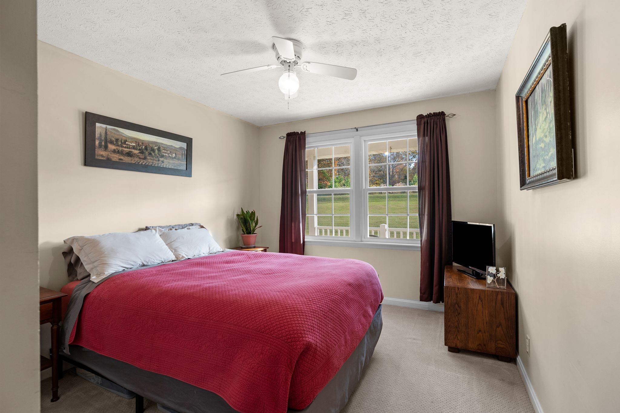 7514 Cox Pike Fairview, TN 37062 - Photo 15 of 37 a bedroom with a bed and a window