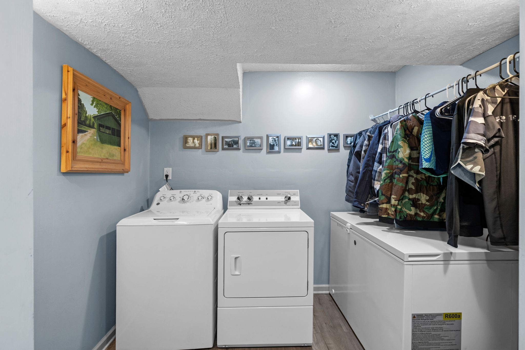 7514 Cox Pike Fairview, TN 37062 - Photo 22 of 37 a view of storage and utility room with washer and dryer