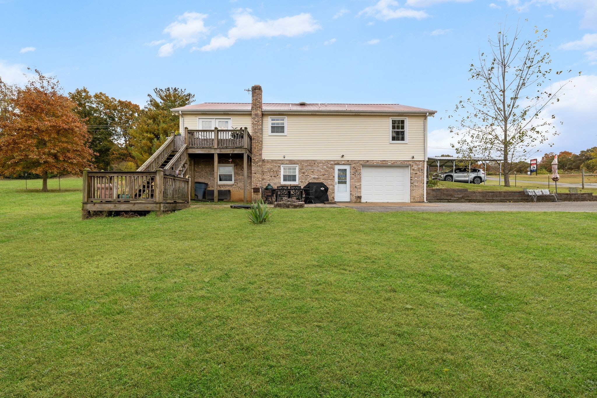7514 Cox Pike Fairview, TN 37062 - Photo 27 of 37 a view of a house with a big yard and large trees
