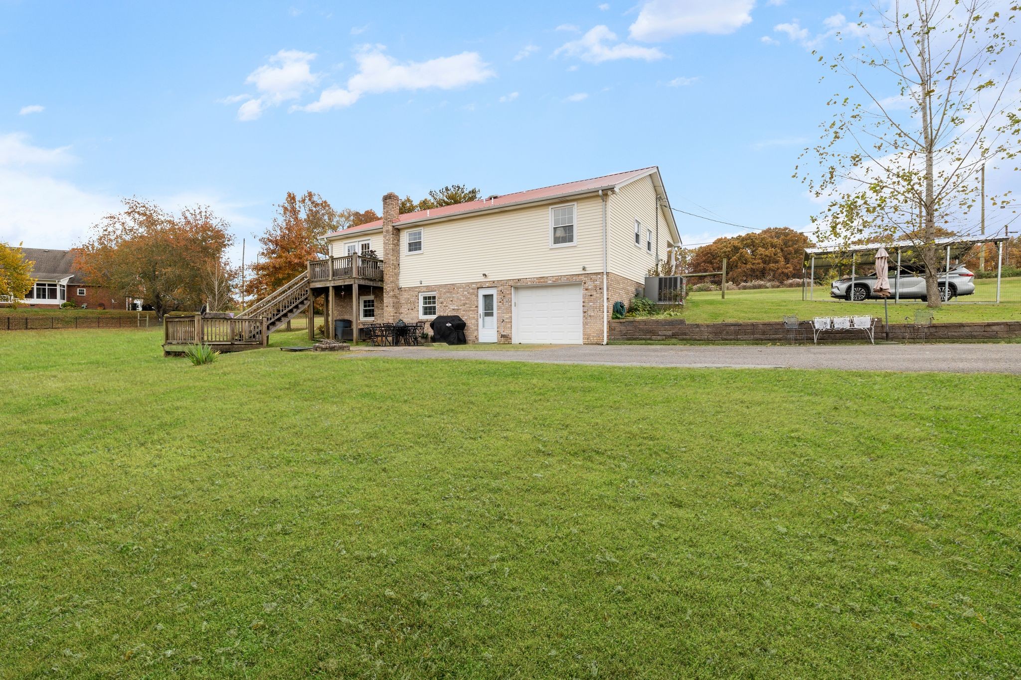7514 Cox Pike Fairview, TN 37062 - Photo 28 of 37 a view of a house with a big yard and large trees
