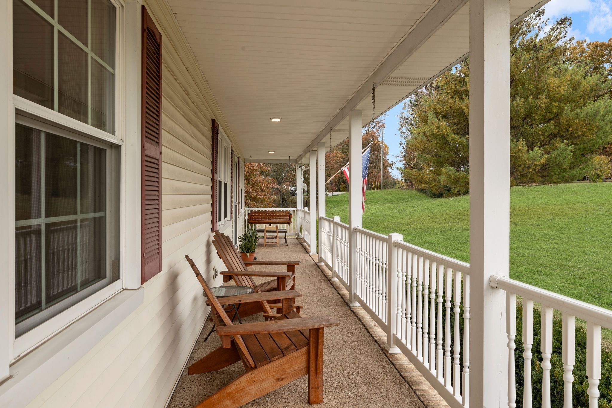 7514 Cox Pike Fairview, TN 37062 - Photo 3 of 37 a view of a balcony with chair and table