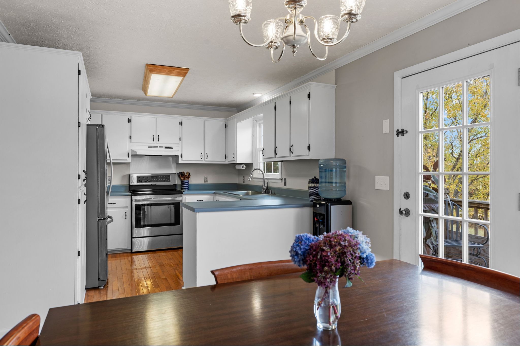 7514 Cox Pike Fairview, TN 37062 - Photo 10 of 37 a kitchen with stainless steel appliances granite countertop a refrigerator sink and cabinets