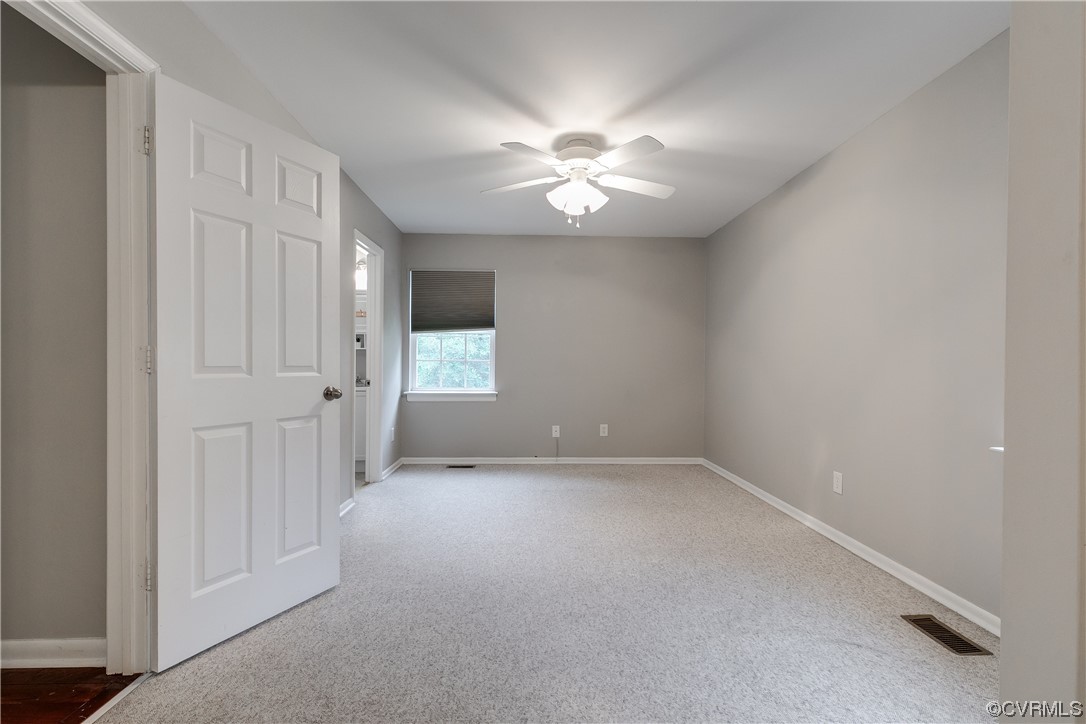 213 Monath Road Chesterfield, VA 23236 - Photo 19 of 38 an empty room with chandelier fan