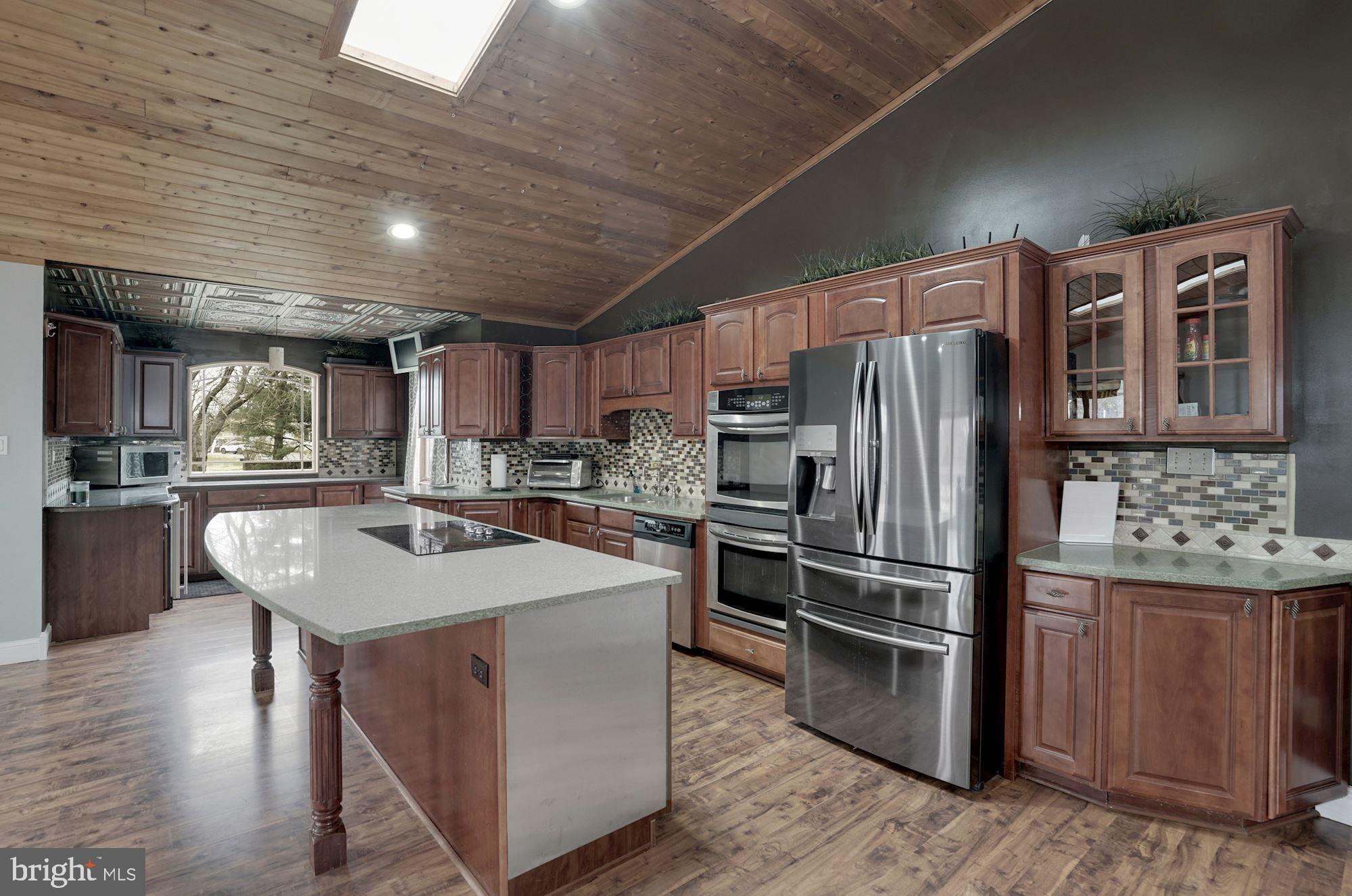 6823 Old Solomons Island Road Friendship, MD 20758 - Photo 18 of 41 Stainless Steel Appliances, Huge Granite Island