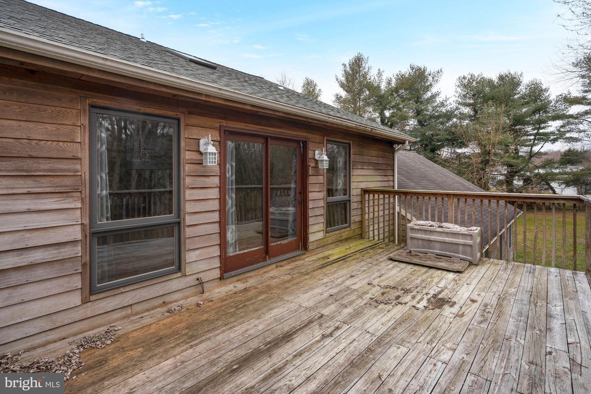 6823 Old Solomons Island Road Friendship, MD 20758 - Photo 27 of 41 Deck off of primary bedroom