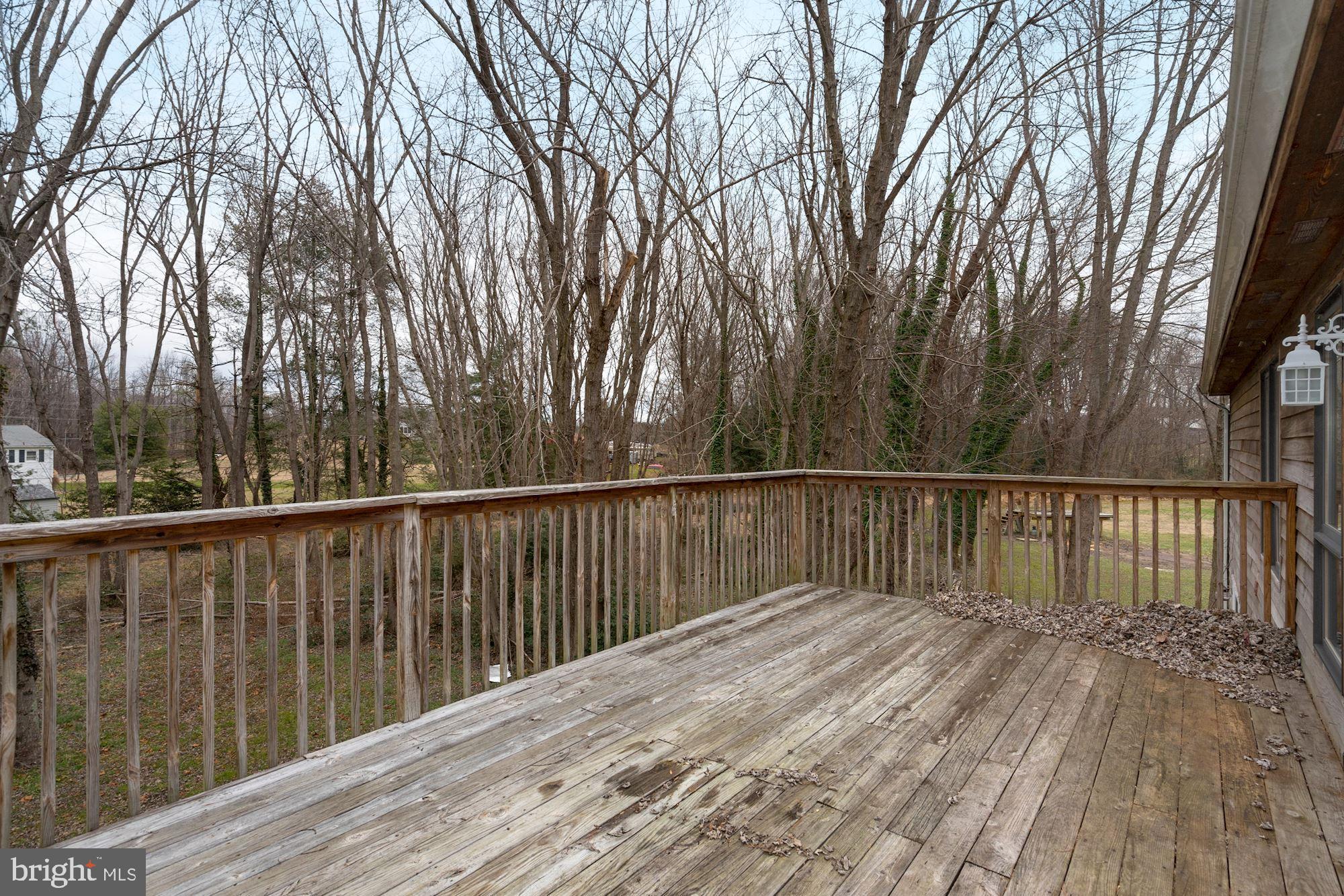 6823 Old Solomons Island Road Friendship, MD 20758 - Photo 28 of 41 Deck off of primary bedroom