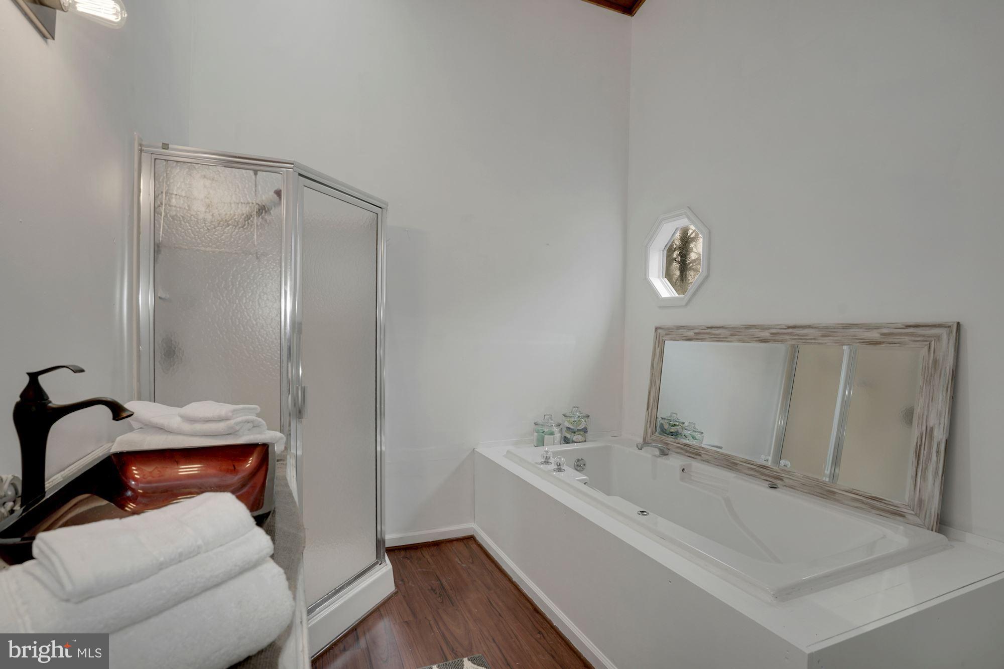 6823 Old Solomons Island Road Friendship, MD 20758 - Photo 31 of 41 Ensuite bath Primary bedroom