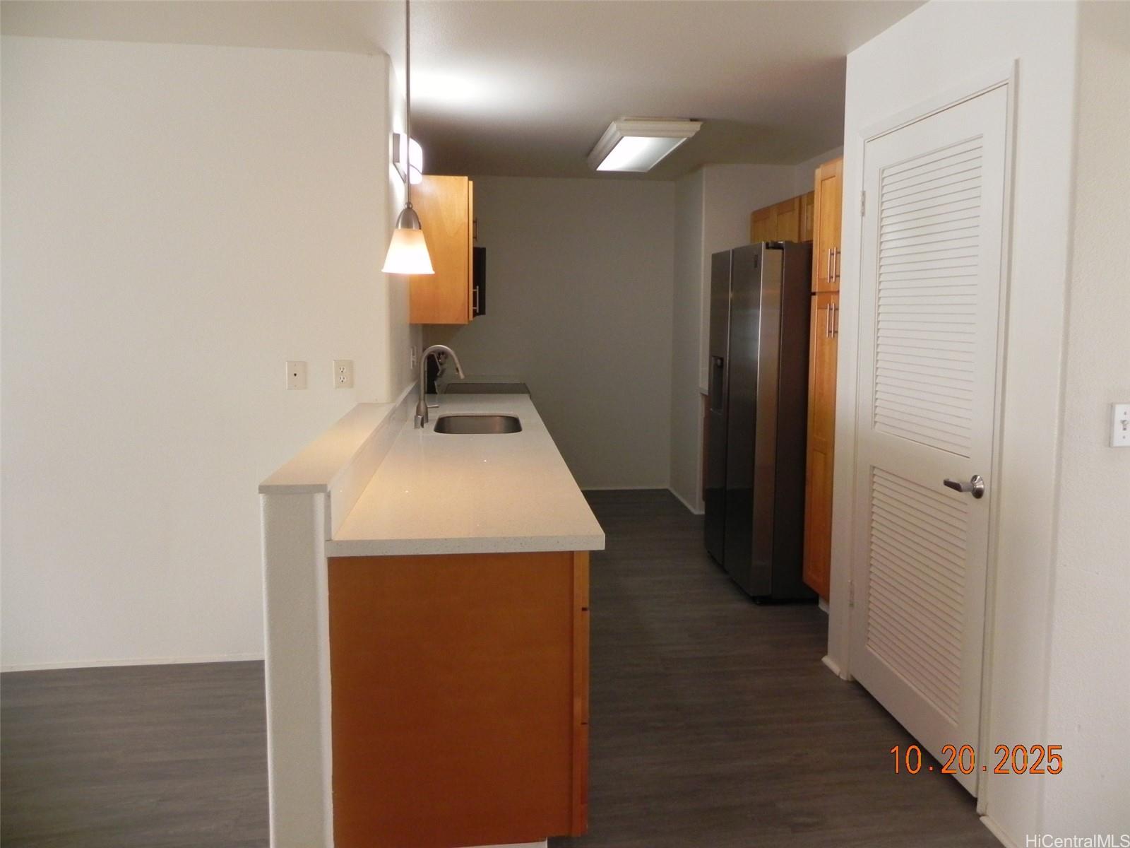 91-1191 Kaiau Avenue, Unit 1602 Kapolei, HI 96707 - Photo 8 of 12 Kitchen Area