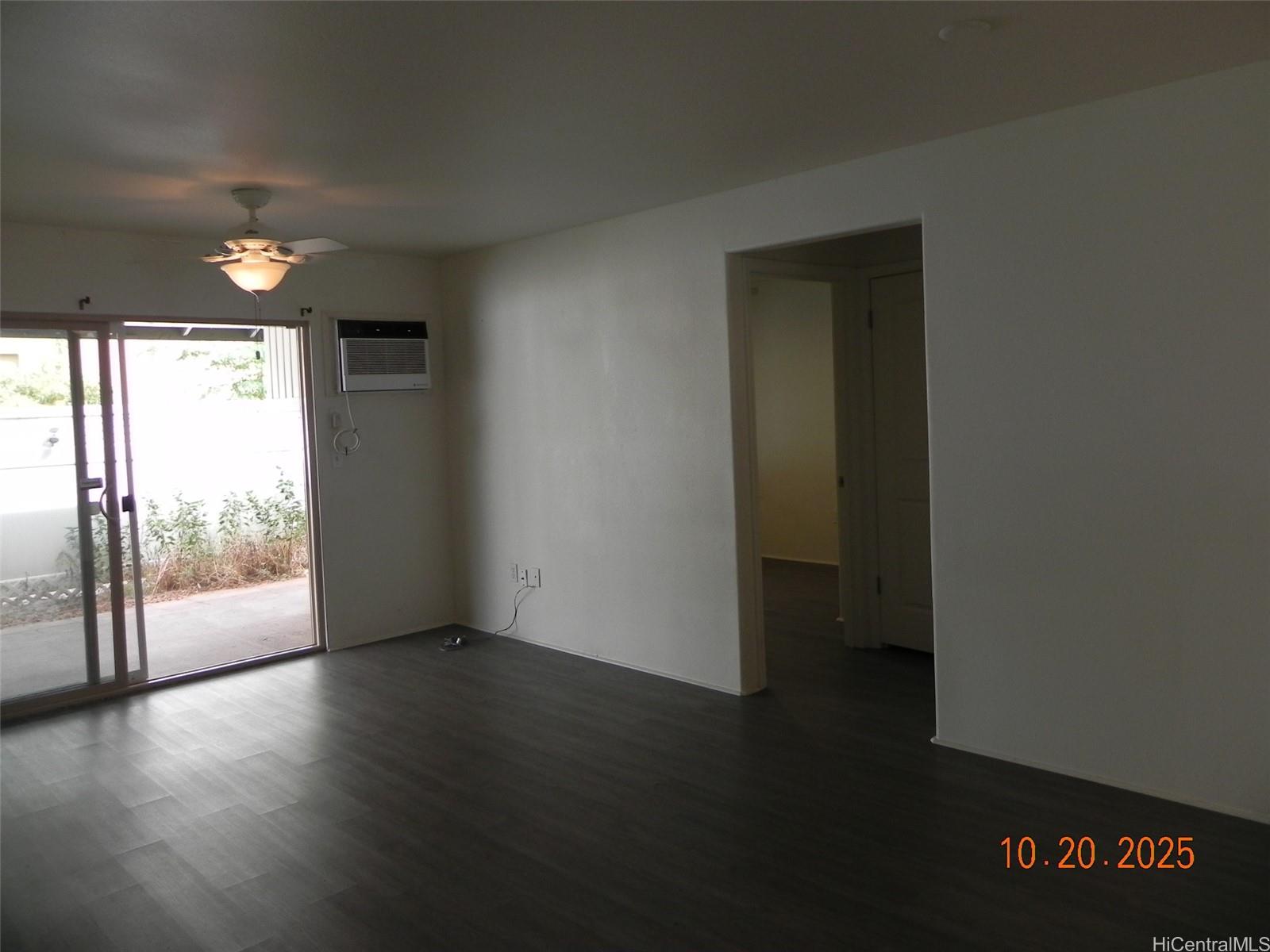 91-1191 Kaiau Avenue, Unit 1602 Kapolei, HI 96707 - Photo 9 of 12 Living area looking at lanai