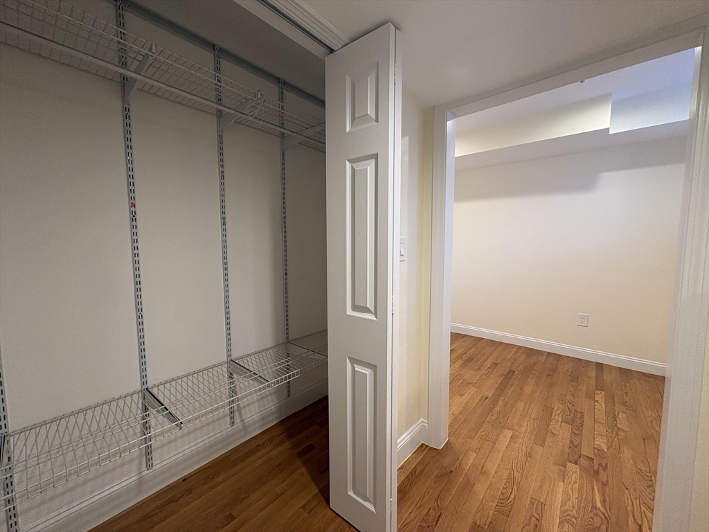 1801 Beacon Street, Unit 1 Brookline, MA 02445 - Photo 11 of 14 a view of wooden floor