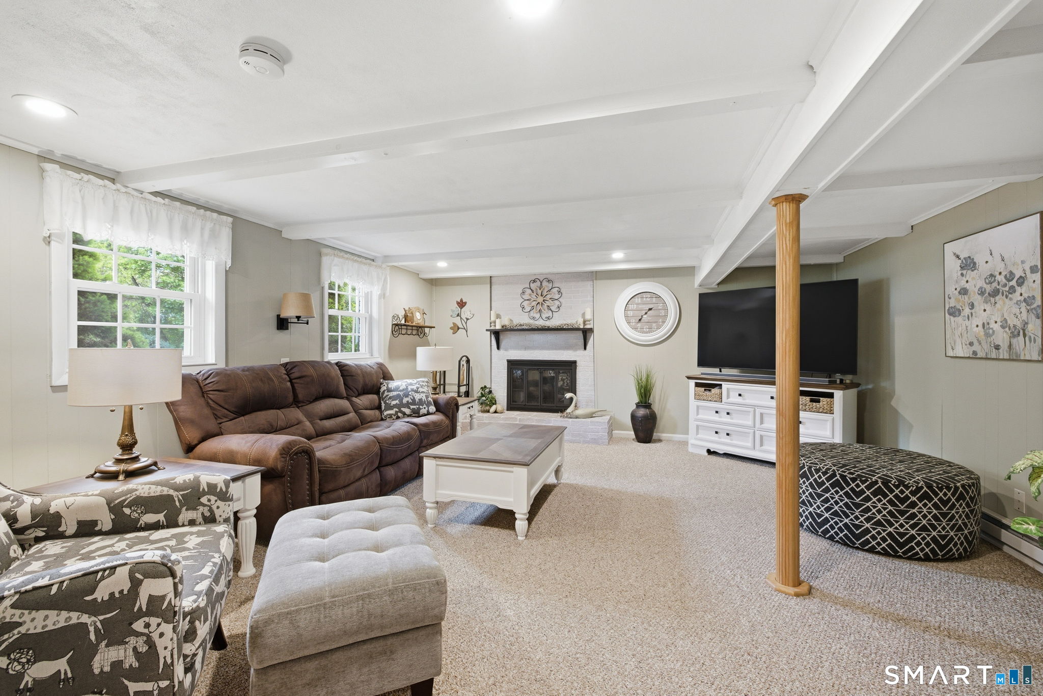 7 Stardust Drive Enfield, CT 06082 - Photo 19 of 38 a living room with furniture and a flat screen tv
