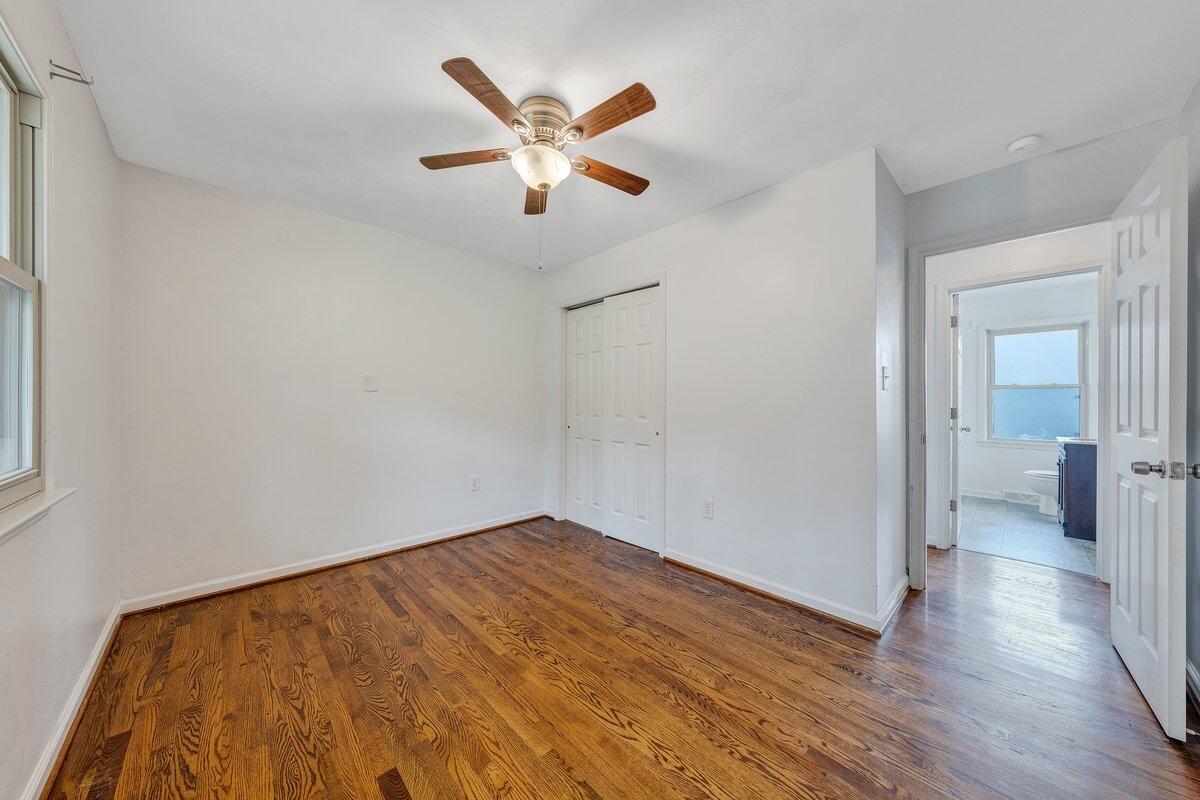 756 Kenyon Road Vinton, VA 24179 - Photo 6 of 14 wooden floor in an empty room and a bathroom