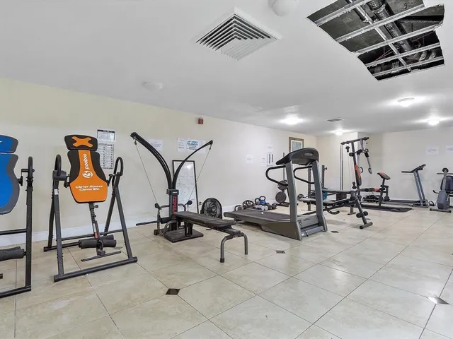 a view of a room with gym equipment