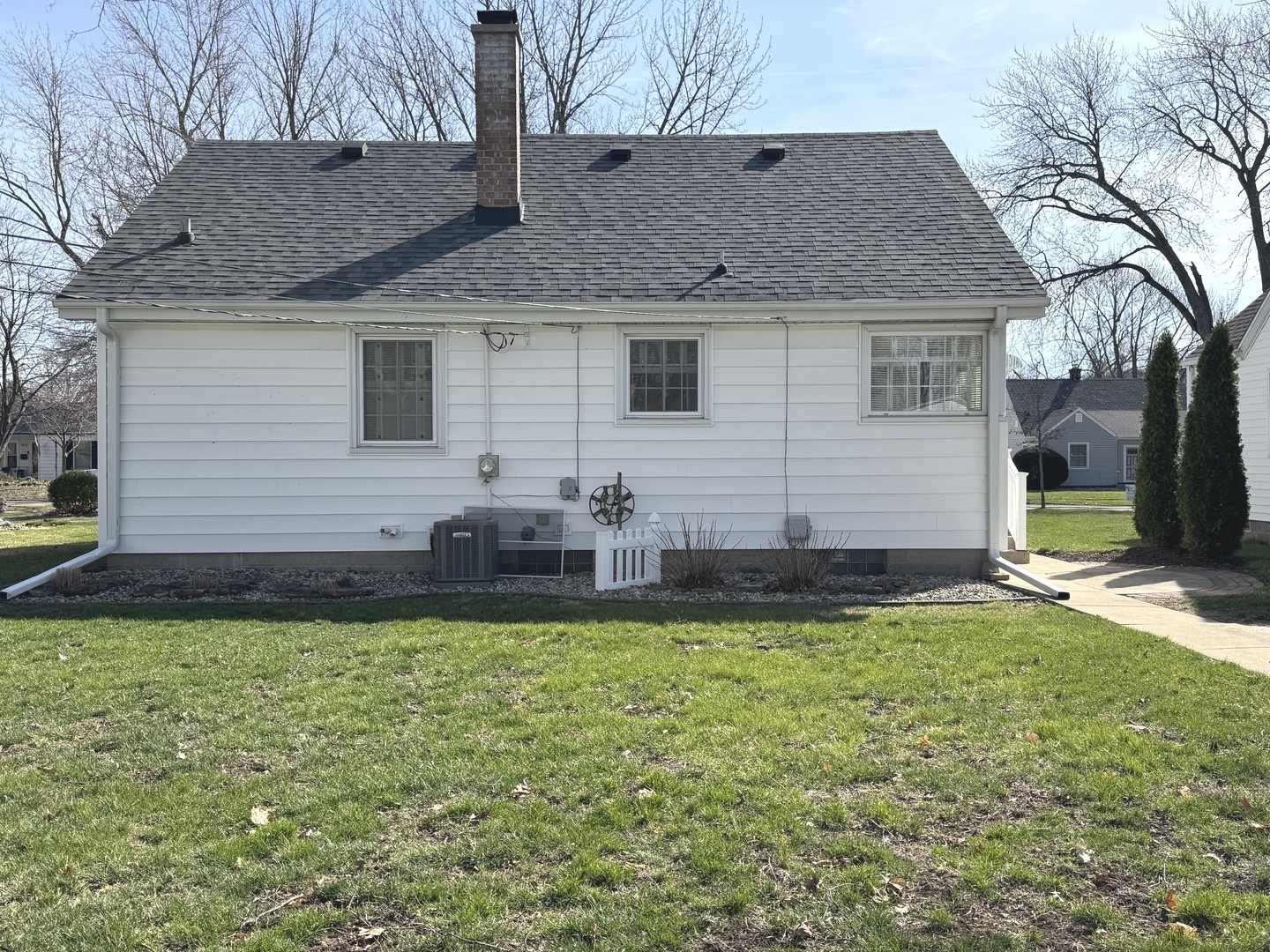 665 South May Avenue Kankakee, IL 60901 - Photo 19 of 22 a view of a house with a yard and plants