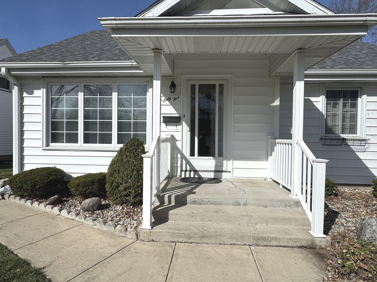 665 South May Avenue Kankakee, IL 60901 - Photo 2 of 22 a front view of a house with a porch