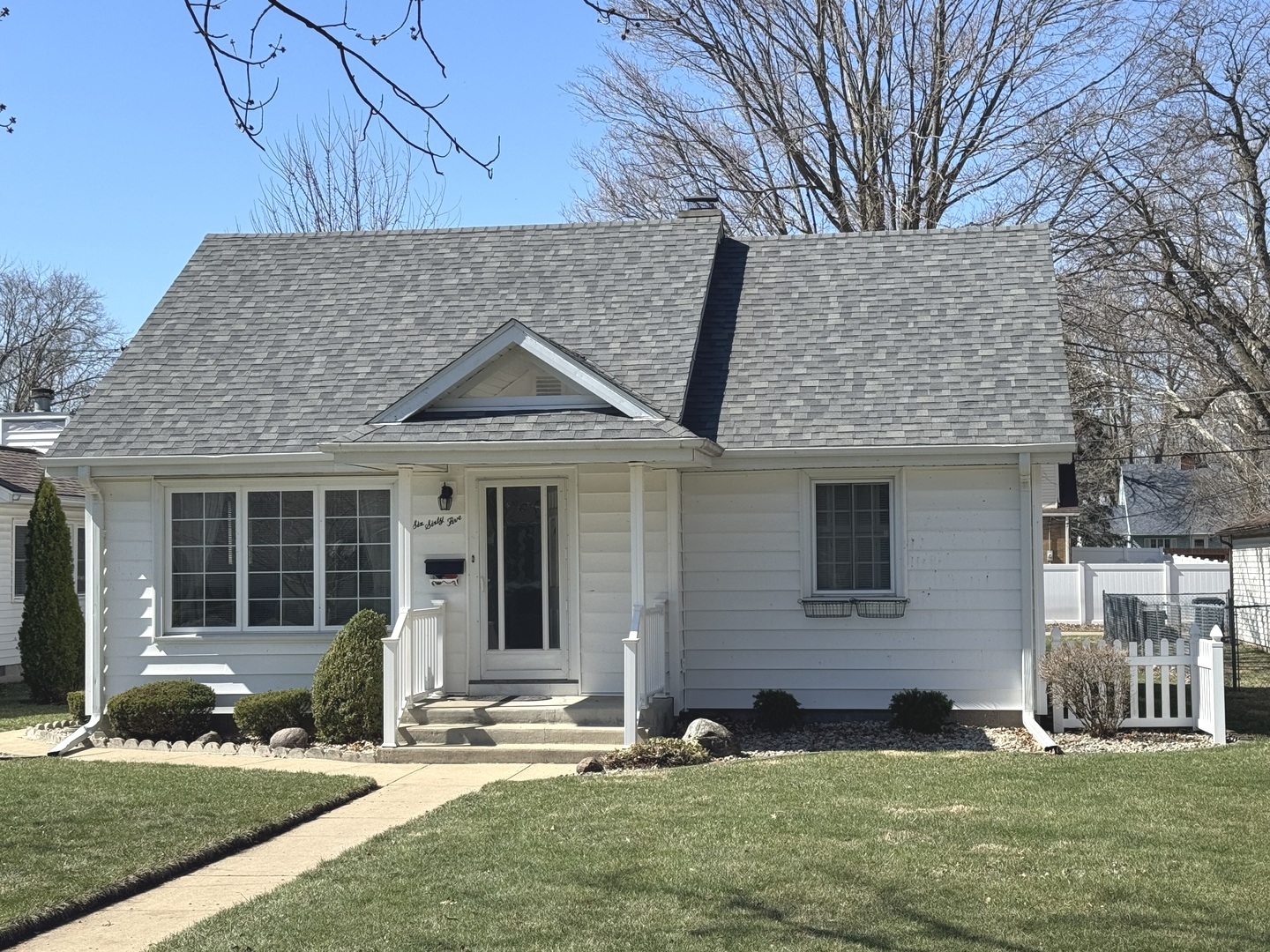 665 South May Avenue Kankakee, IL 60901 - Photo 22 of 22 a front view of a house with a yard
