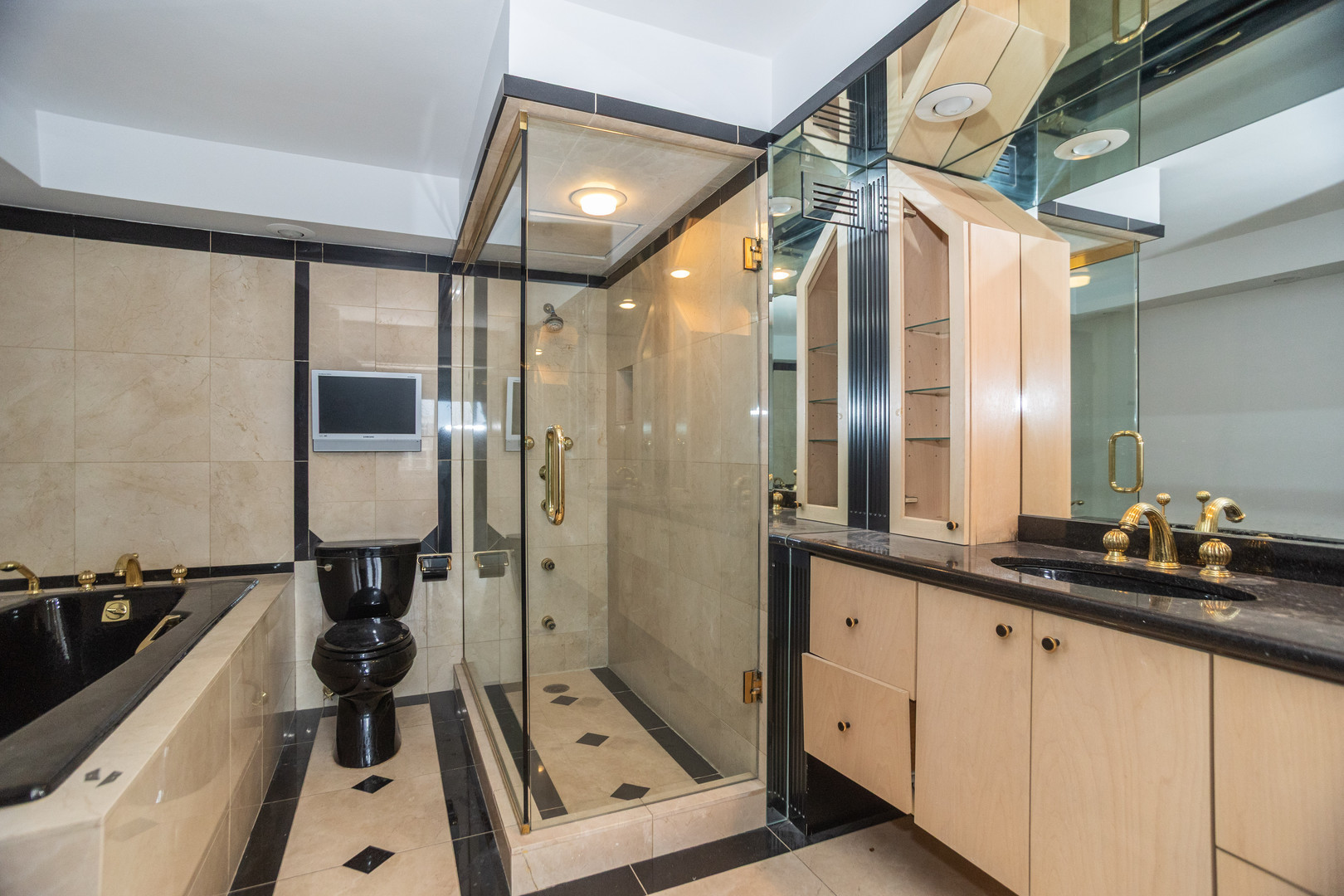 1440 North Lake Shore Drive, Unit 22ABCD Chicago, IL 60610 - Photo 21 of 21 a bathroom with a sink and a mirror
