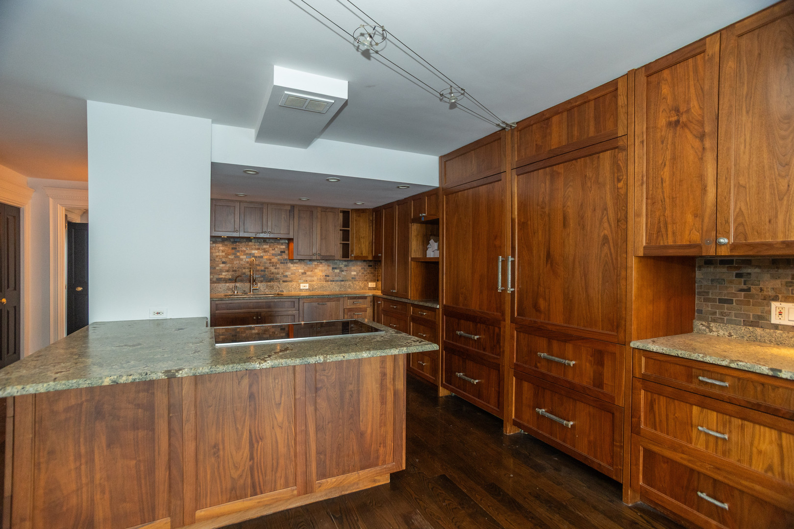 1440 North Lake Shore Drive, Unit 22ABCD Chicago, IL 60610 - Photo 10 of 21 a kitchen with stainless steel appliances granite countertop a stove and a refrigerator