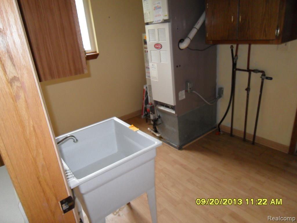 9990 Webb Road Goodells, MI 48027 - Photo 15 of 18 laundry.jpg