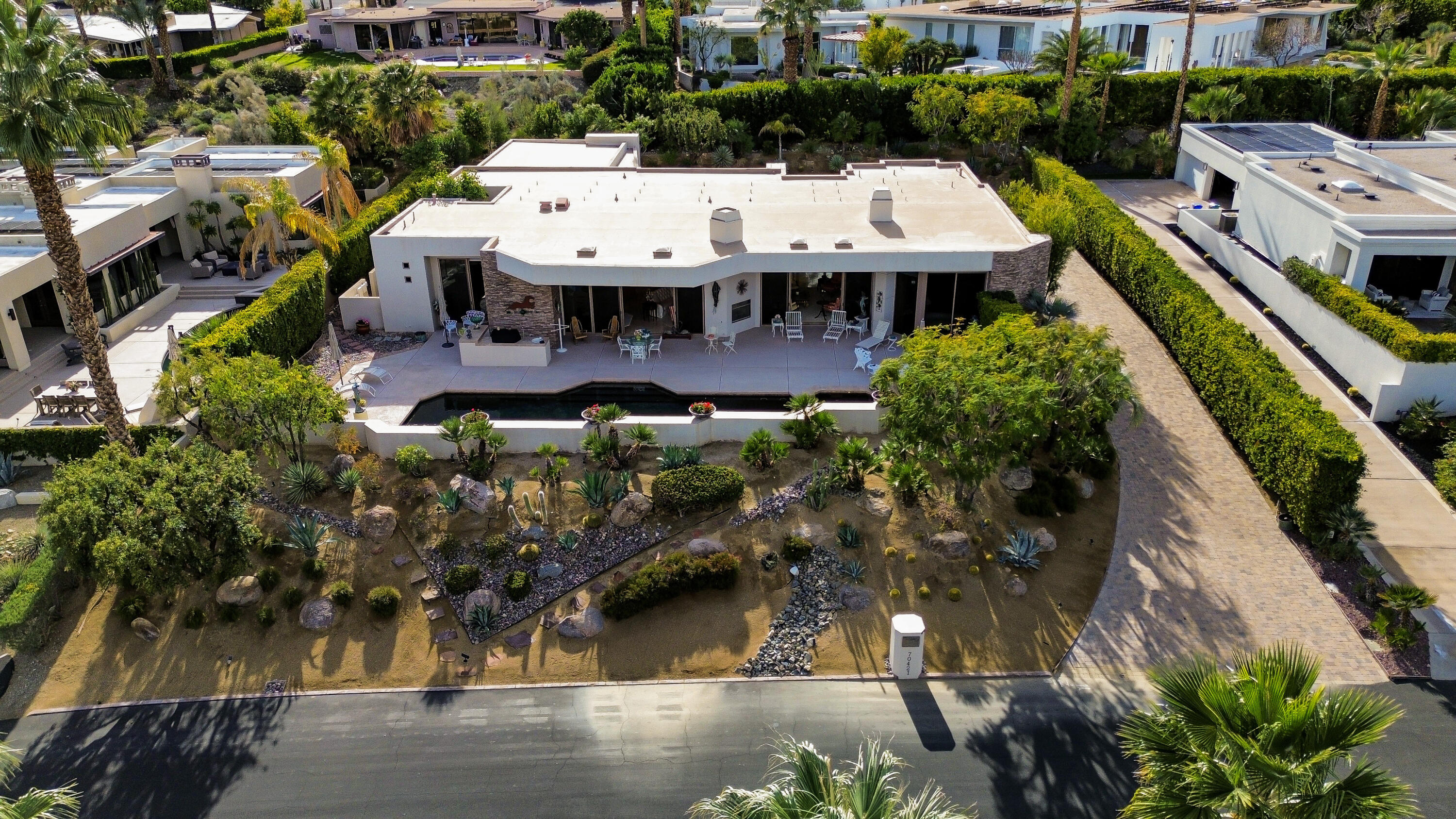 70421 Placerville Road Rancho Mirage, CA 92270 - Photo 2 of 2 a view of multiple houses with a yard