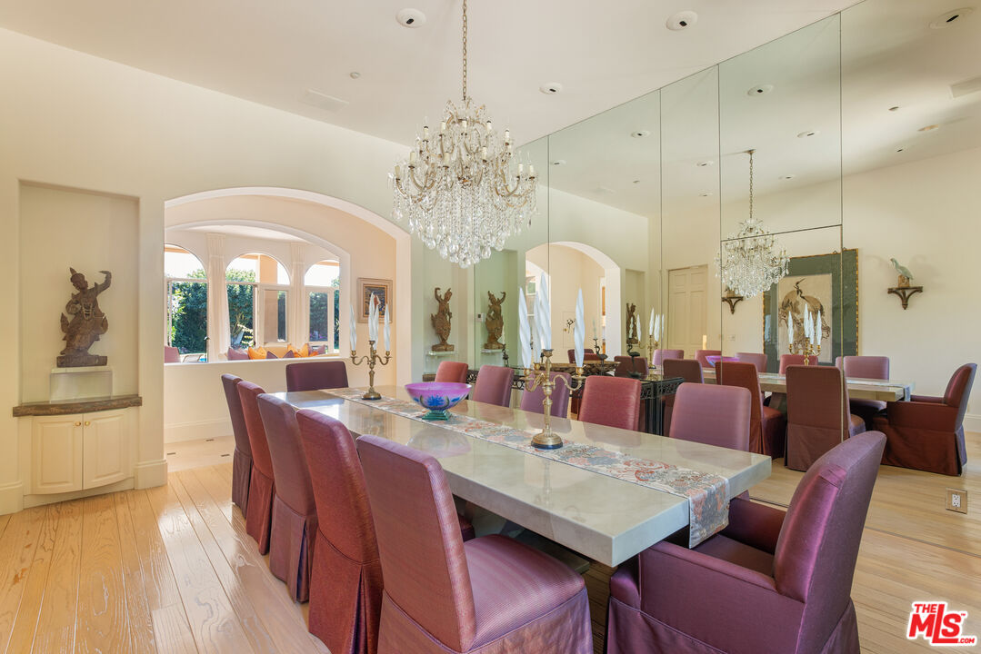 510 Doheny Road Beverly Hills, CA 90210 - Photo 12 of 24 a view of a dining room with furniture