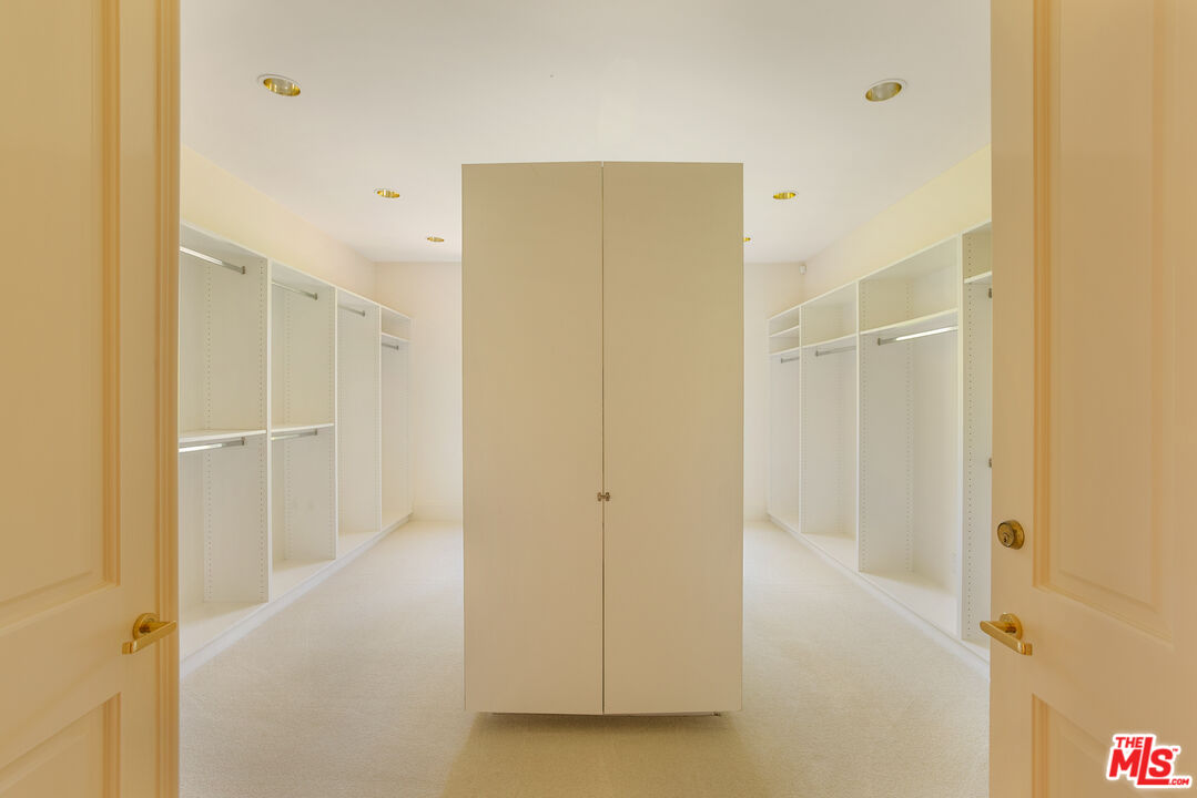 510 Doheny Road Beverly Hills, CA 90210 - Photo 19 of 24 a view of closet area