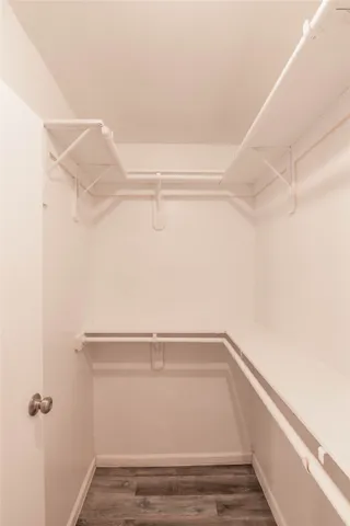 a view of a room with racks on the wall