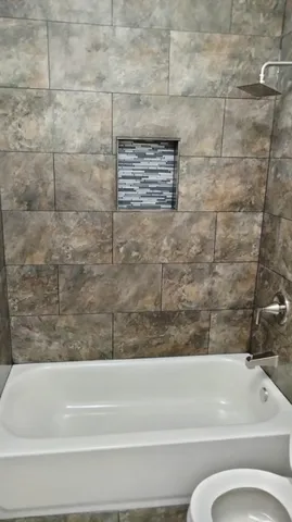 a bathroom with a bathtub