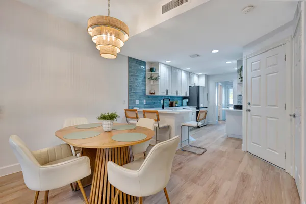 a view of a dining room with furniture