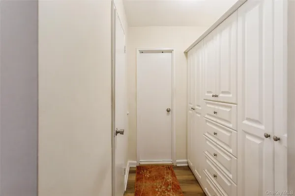 a bathroom with a shower and a sink