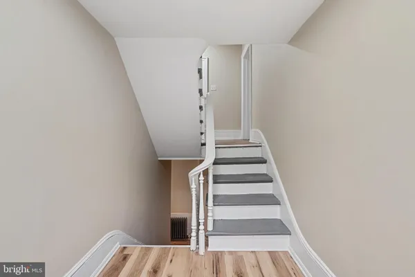 a view of entryway with wooden floor