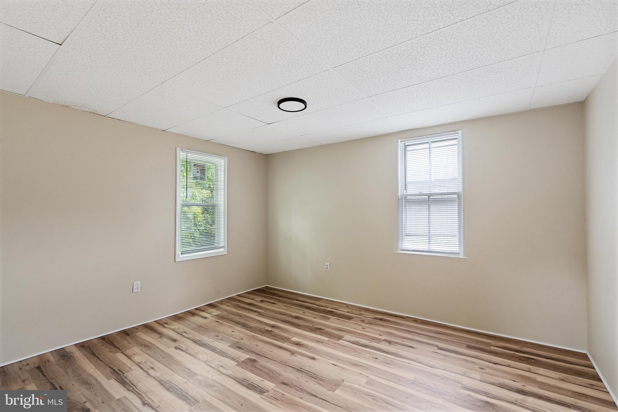 154 7th Street Salem, NJ 08079 - Photo 25 of 48 a view of empty room with wooden floor